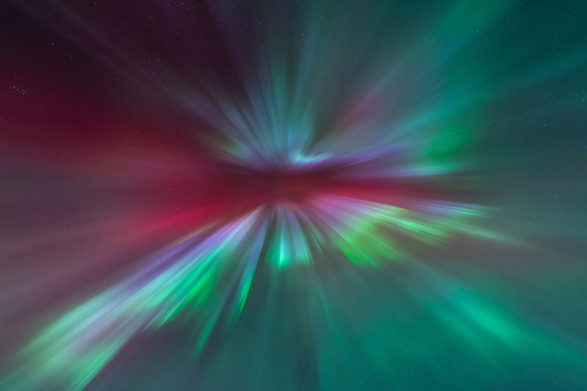 Strong aurora corona display photographed with wide-angle lens settings